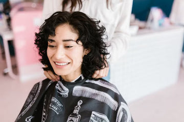 Woman smiling with freshly styled hair