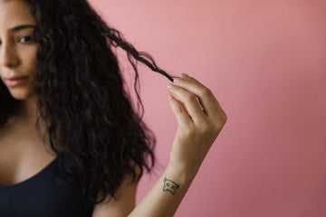 Woman with frizzy, unstyled curls