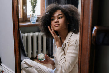 girl-applying-skincare-products