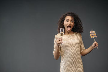 Woman with styled hair celebrating New Year's Eve